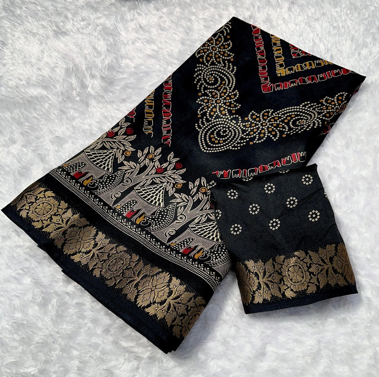 Foil design detail on black marshmallow blooming saree