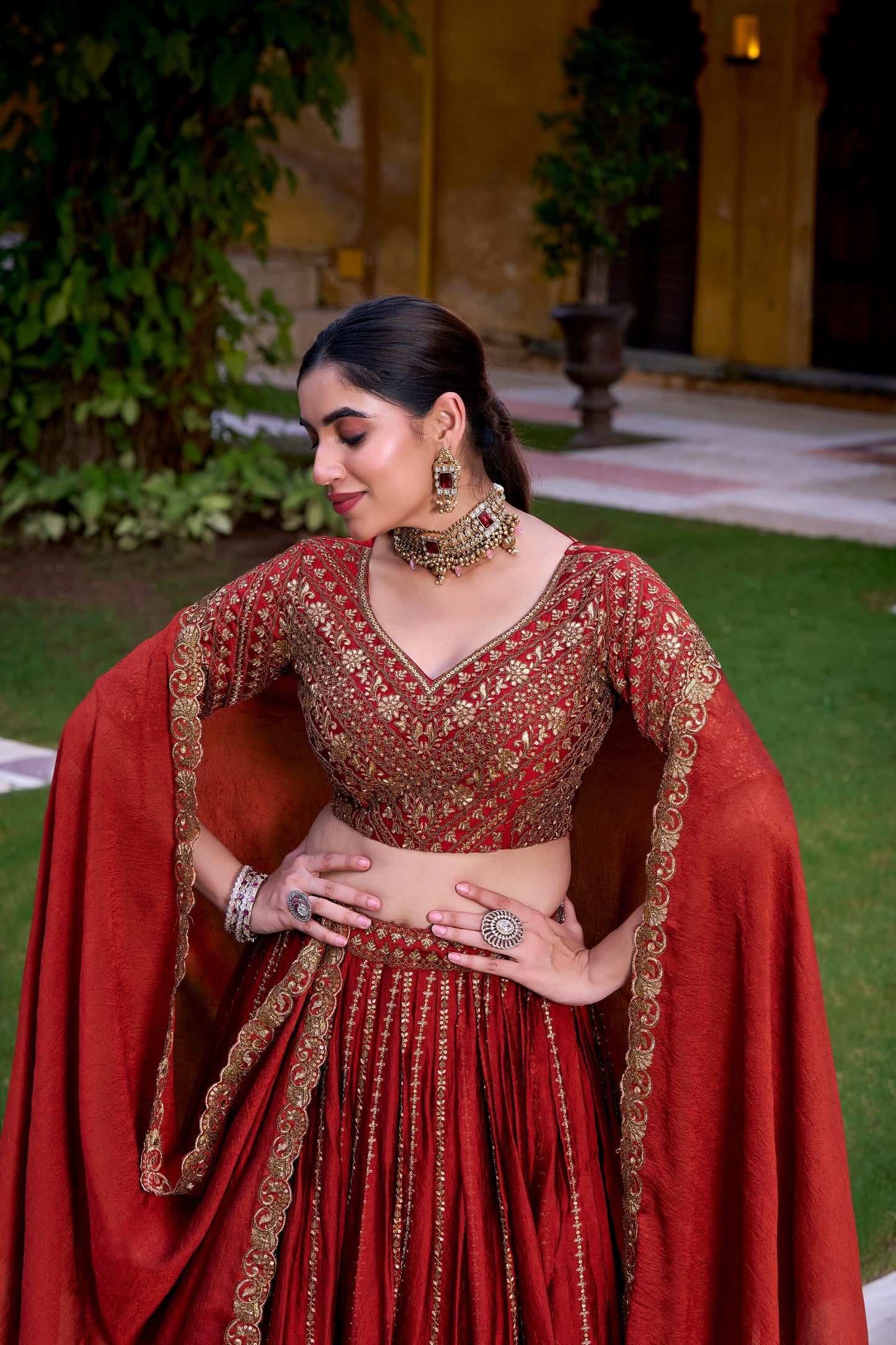 Orange Lehenga Choli Crafted In Rangoli Silk With Intricate Embroidery & Sequins