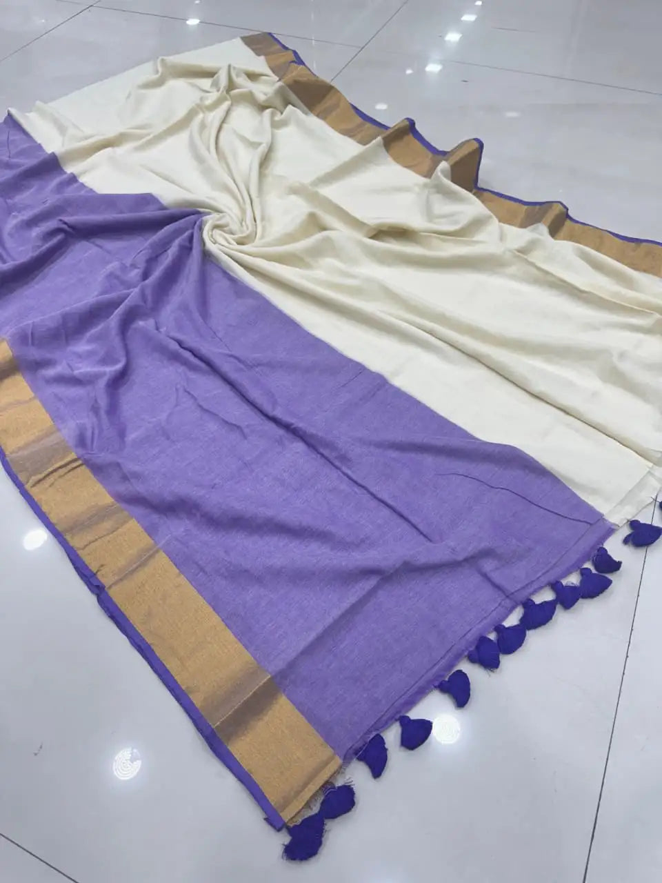 Half & Half South Mul Cotton Saree made from pure mul cotton with decorative pom-pom border, lightweight and trendy ethnic saree