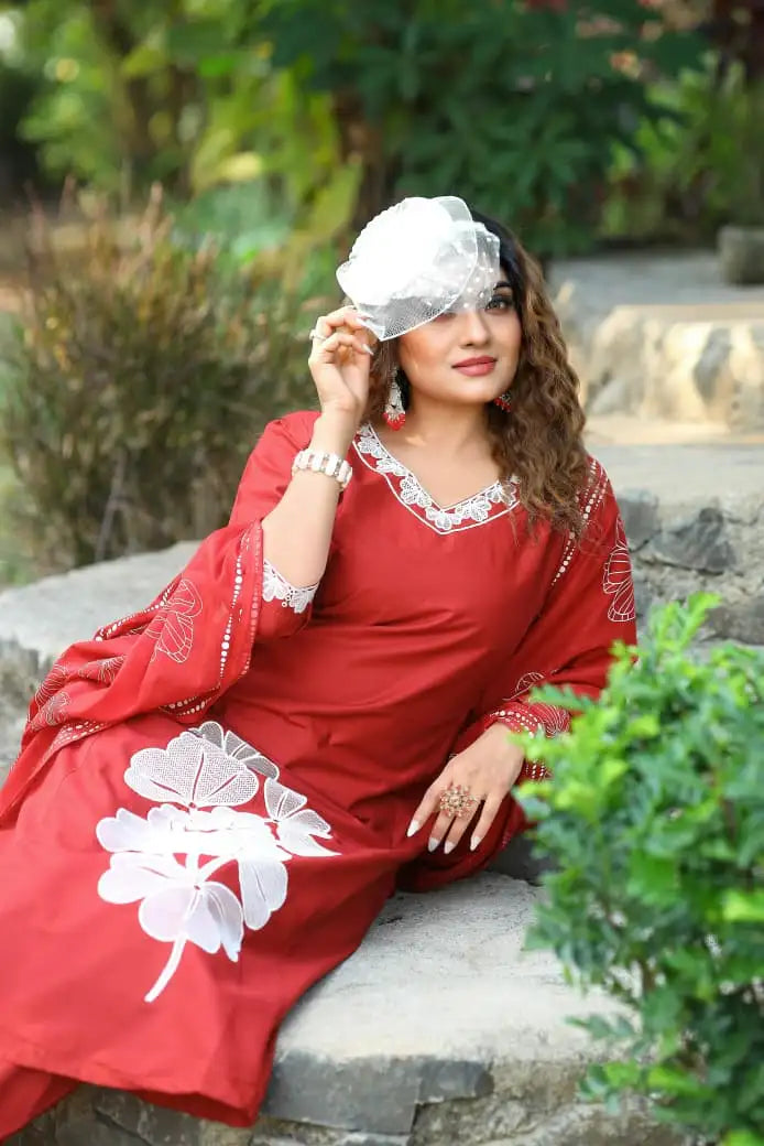 Close-up of embroidery work on maroon pure cotton A-line kurti
