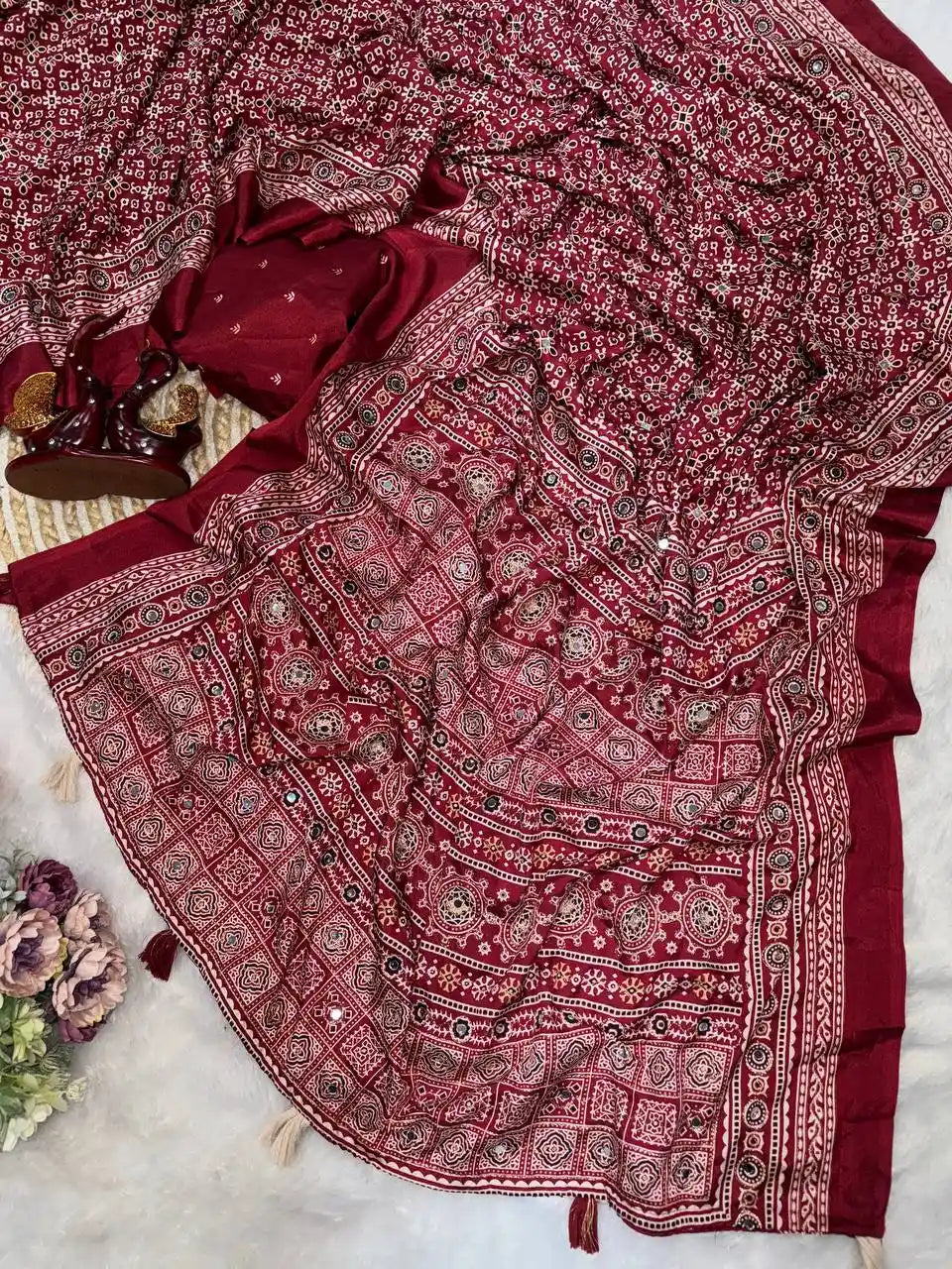 Women's maroon soft crepe silk saree with Ajrakh print and real mirror work front