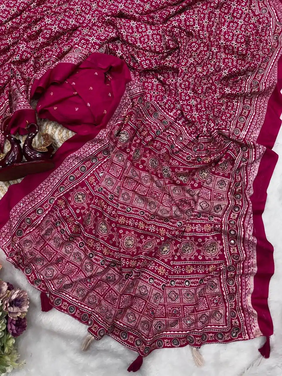 Women's rani soft crepe silk saree with Ajrakh print zari and real mirror work