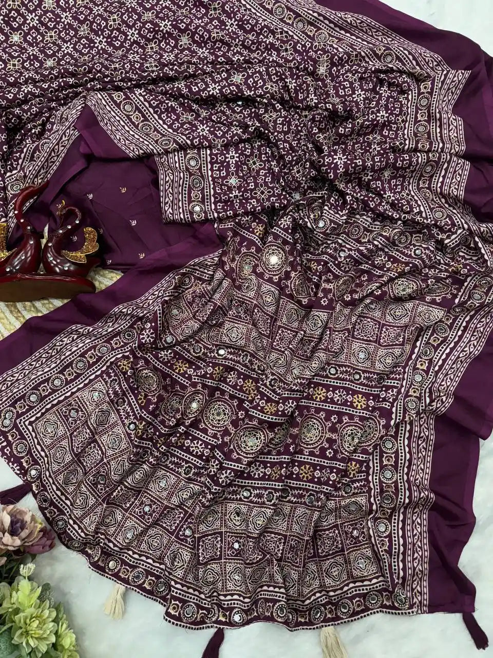 Women's wine soft crepe silk saree with Ajrakh print zari and real mirror work