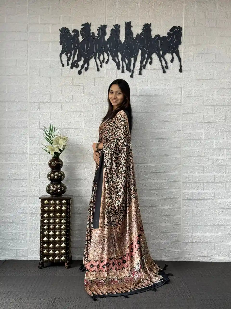 Women's black soft mal cotton saree with real mirror work and viscose latkan front view