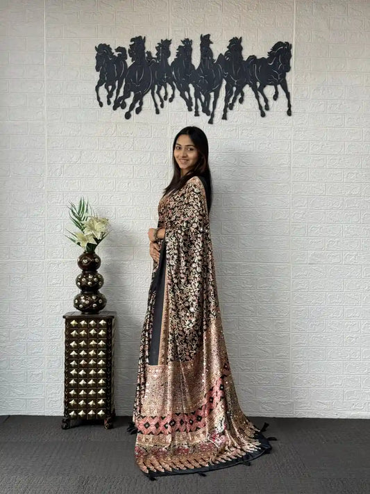 Women's black soft mal cotton saree with real mirror work and viscose latkan front view