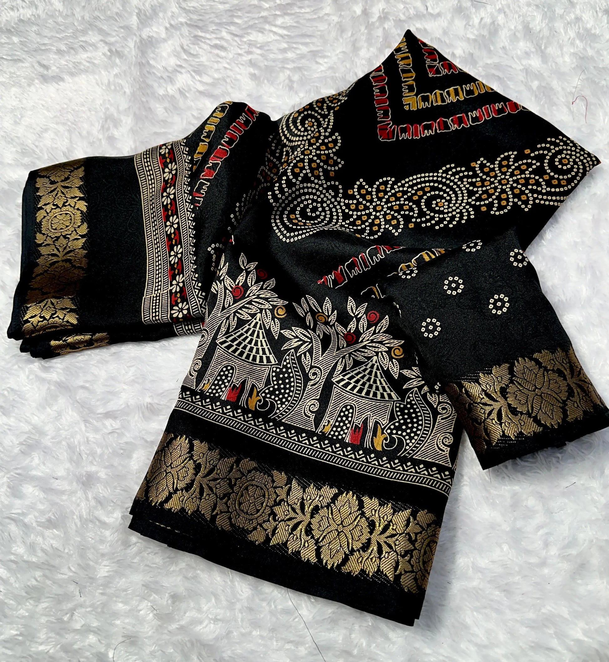 Close-up of 3-side zari weaving border on black marshmallow blooming saree
