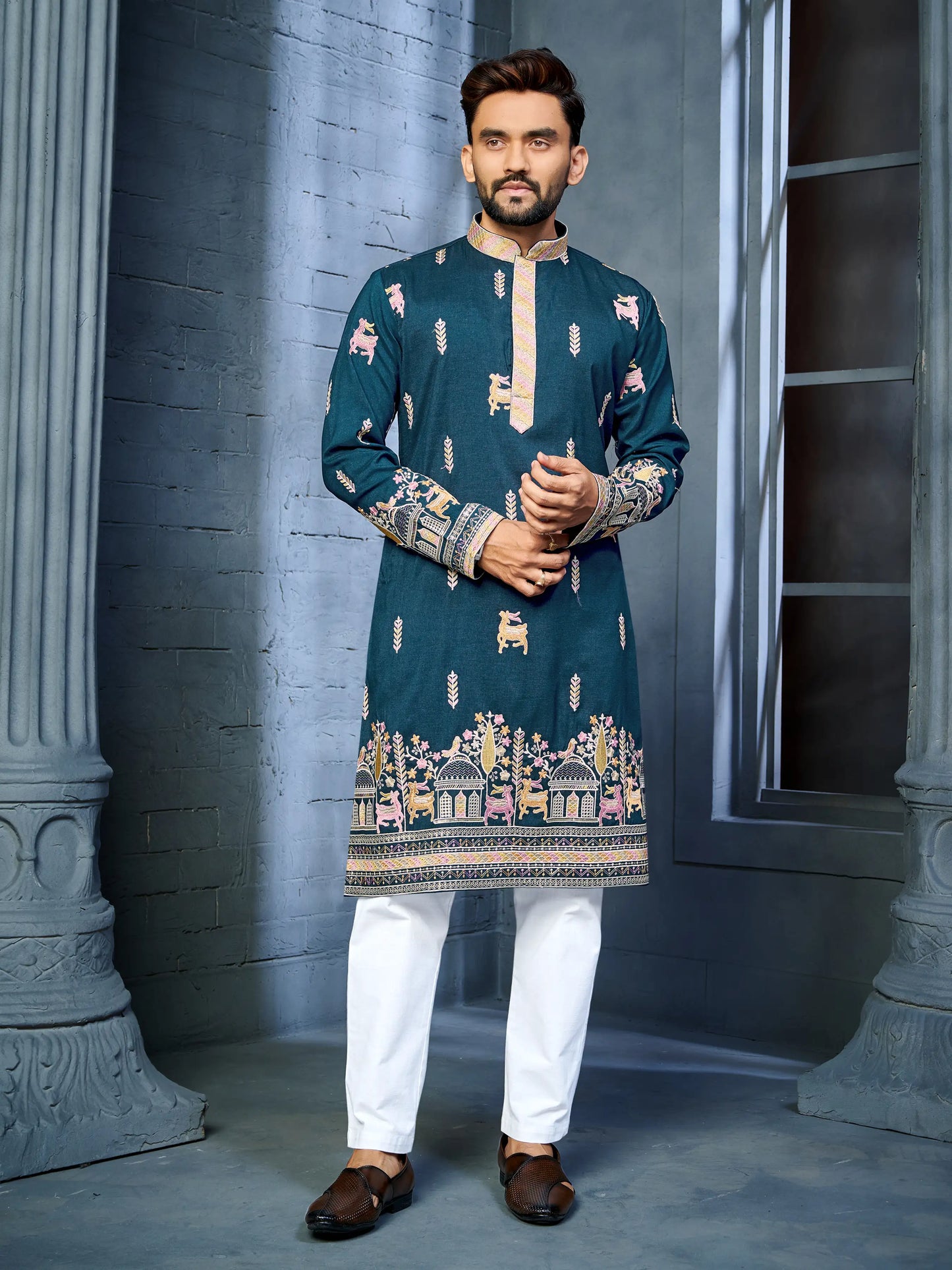 Men's teal blue soft silk daaman kurta with multi-thread deer embroidery pattern front view
