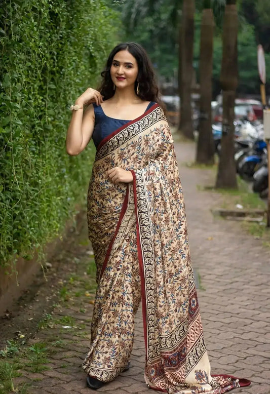 Ajrakh print semi gajji silk saree with rich pallu and contrast digital print blouse