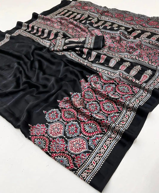 sanvi fashion semi gajji japan satin silk saree with ajrakh print border and contrast blouse
