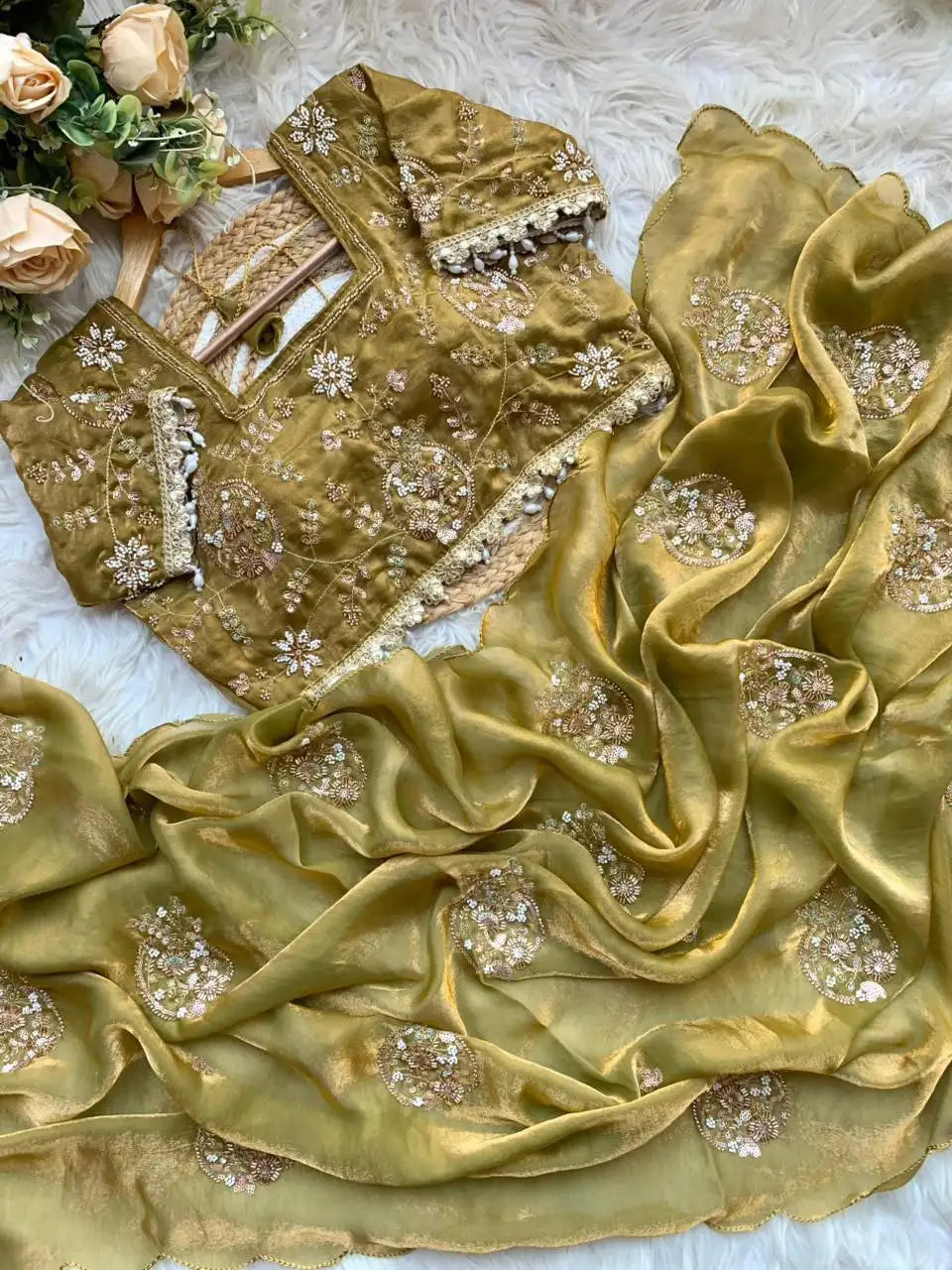 space silk saree with heavy embroidery beats work and stitched blouse