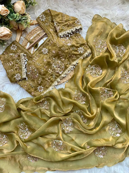 space silk saree with heavy embroidery beats work and stitched blouse