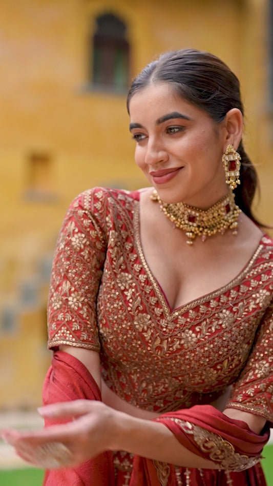 Orange Lehenga Choli Crafted In Rangoli Silk With Intricate Embroidery & Sequins